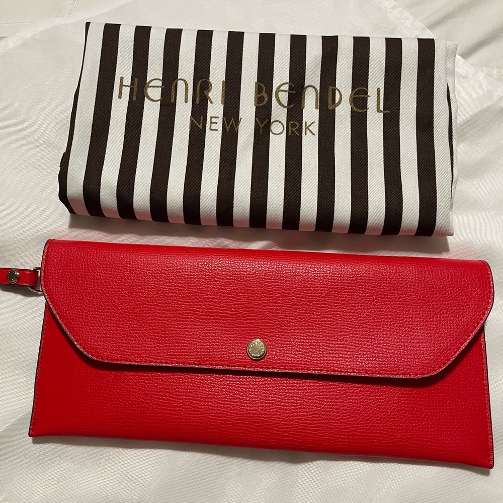 Henri Bendel New York Orange wristlet.